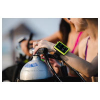 Diver with a Suunto Eon Core in lime. Image to the...